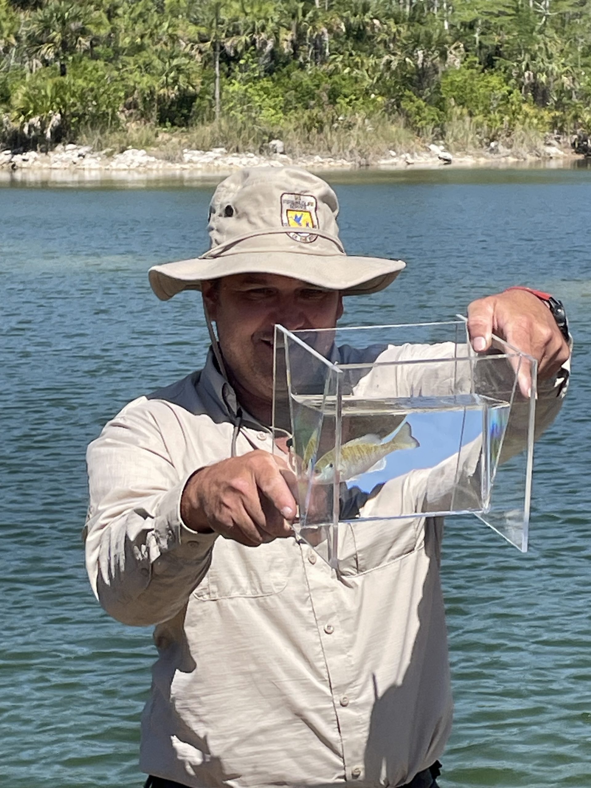Mark Danaher with fish photo case